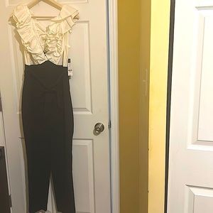 Brand new black/white jumpsuit. Never worn. Ny & company style